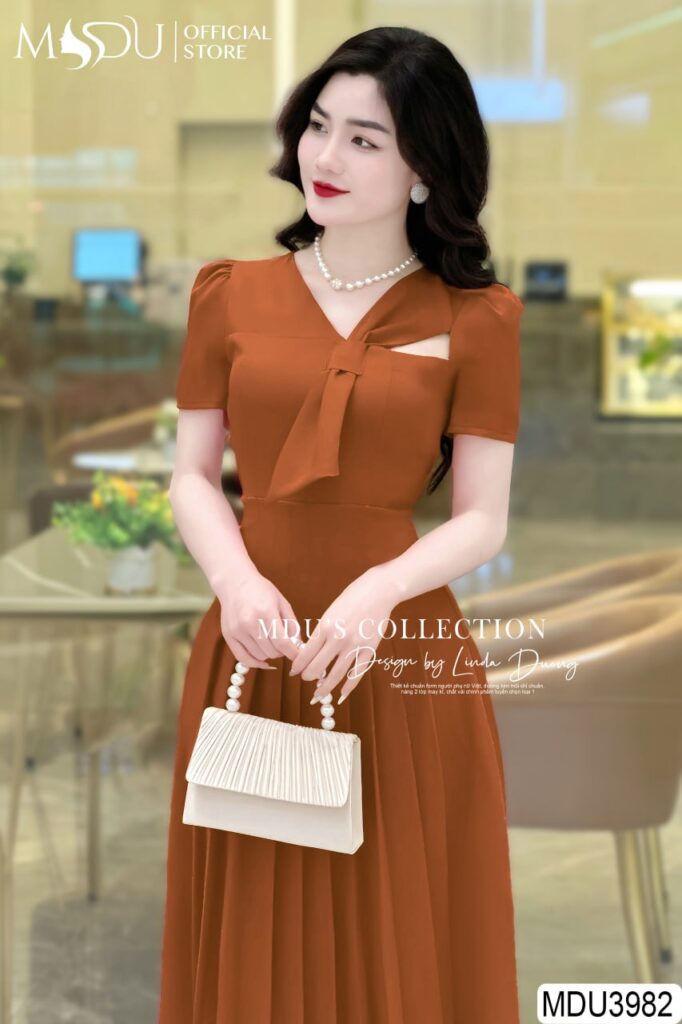 Khám Phá Top 10+ Mẫu Đầm Dự Tiệc Màu Cam Đầy Ấn Tượng 15 Cách Chọn Đầm Dự Tiệc Màu Cam Phù Hợp