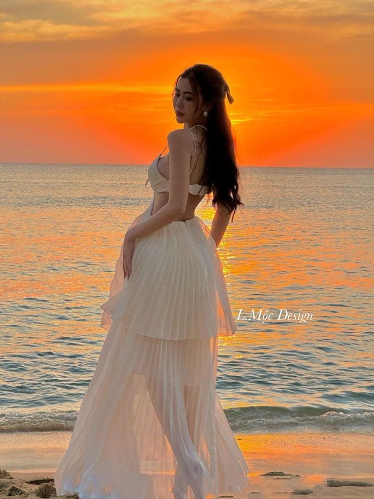 Đầm Maxi Trắng Đi Biển Duyên Dáng Bên Sóng Biển Tinh Khôi 2 Vì Sao Đầm Maxi Trắng Đi Biển Là "Tình Yêu" Của Mình?