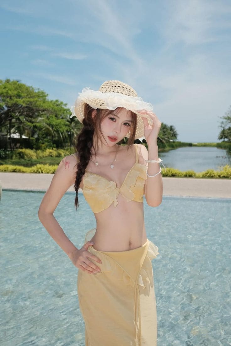 Tạo Dáng Chuẩn Đẹp Với Chân Váy Đi Biển Trong Mọi Hoàn Cảnh 18 Tắm biển và hoạt động năng động