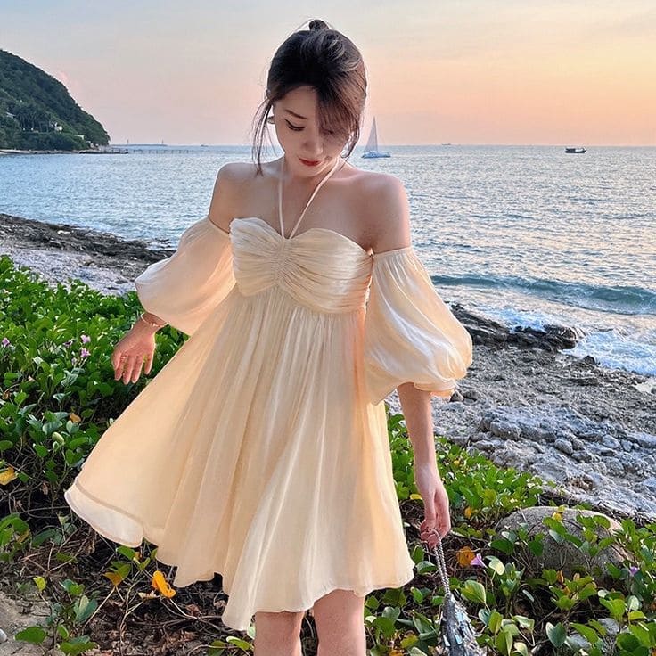 Đi Biển Mặc Gì Cho Người Béo? Xem Ngay 8+ Gợi Ý Này! 8 Những Kiểu Trang Phục Đỉnh Cao Cho Cô Nàng "Tròn Trịa" - Đầm Trễ Vai Tay Bồng