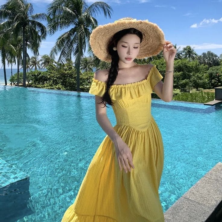 Top Mẫu Váy Đi Biển Màu Vàng Hot Nhất 2025, Tỏa Sáng Như Nắng Hè 15 Phối đồ thế nào để váy đi biển màu vàng “chất” hơn - Trang sức