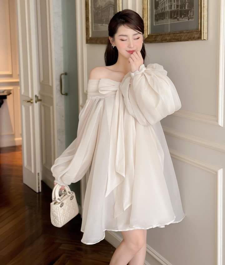 Hướng Dẫn Chọn Váy Trắng Đi Biển Cho Người Béo Tôn Dáng 7 Các kiểu váy trắng đi biển phù hợp với người béo - Váy baby doll trắng