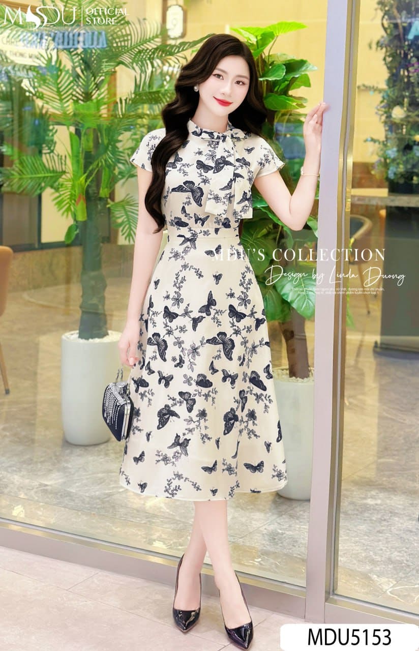 Váy Thiết Kế MDU5153 Lụa Mango Dáng Xòe Nhẹ Cổ Tàu Phối Nơ Họa Tiết Bướm Hoa Đen Trên Nền Kem 20 Váy Thiết Kế MDU5153 Lụa Mango Dáng Xòe Nhẹ Cổ Tàu Phối Nơ Họa Tiết Bướm Hoa Đen Trên Nền Kem