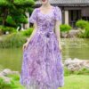 Váy Thiết Kế MDU5086 Tơ Xước Dáng Dài Xòe Nhẹ Cổ Cách Điệu Tay Loe Rũ Hoa Văn Tím Hồng Nhẹ Nhàng Và Nữ Tính