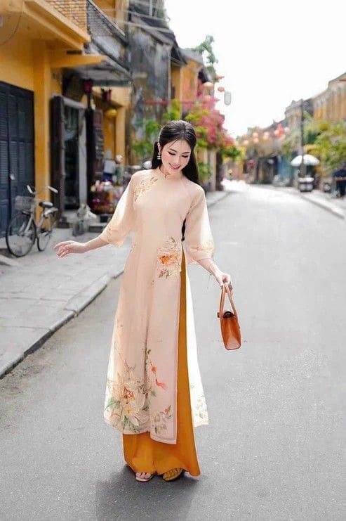 Top 9 Áo Dài Dự Tiệc Cho Mẹ Cô Dâu: Lựa Chọn Tôn Vinh Vẻ Đẹp Đằm Thắm 12 Áo Dài Dự Tiệc Cho Mẹ Cô Dâu Trong Tiệc Cưới Hiện Đại