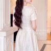 VÁY THIẾT KẾ MDU6848 – GẤM NỔI TRẮNG KEM, CỔ NƠ CÁCH ĐIỆU DUYÊN DÁNG 10 Dressed model in outfit 4K 20260912132028 Mdu Fashion