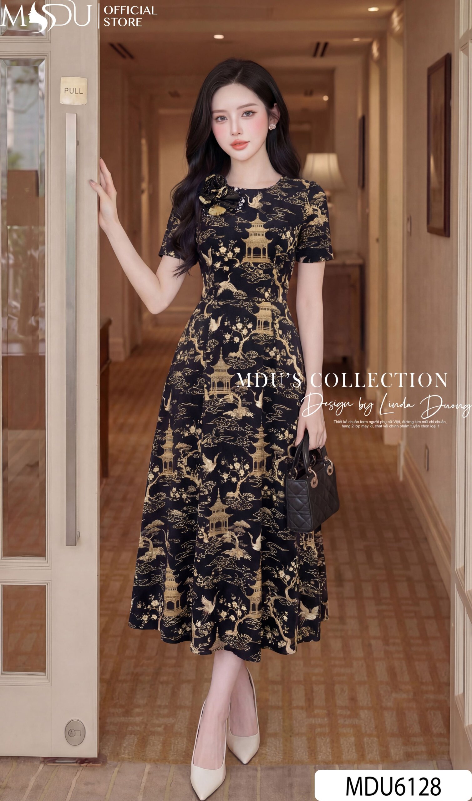 Váy Thiết Kế MDU6128 – Lụa Viscose Đen Họa Tiết, Hoa Thủ Công Đính Cổ Tinh Tế