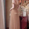 Váy Thiết Kế MDU6361 Voan Tơ Nâu Dáng Xòe Sang Trọng Phối Cổ Chéo Trễ Vai Đính Dây Đá 10 1A realistic portrait of the 202605031614 11zon Mdu Fashion