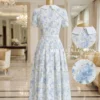 Váy Thiết Kế MDU6618 – Mango Ý Hoa Xanh Pastel, Cổ Sen Phối Đai Rời 15 Dress back view display 4K 202608061706 11zon Mdu Fashion