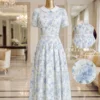 Váy Thiết Kế MDU6618 – Mango Ý Hoa Xanh Pastel, Cổ Sen Phối Đai Rời 14 Dress on mannequin catalog 4K 202608061659 11zon Mdu Fashion