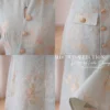 Váy Thiết Kế MDU6459 – Gấm Luxury Xanh Ngọc, Họa Tiết Ánh Kim Dệt Jacquard Sang Trọng 15 Floor on mannequin close up 4K 202607131354 3 11zon Mdu Fashion