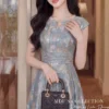 Váy Thiết Kế MDU6318 Mango Ý Cao Cấp Dáng Xòe Sang Trọng Phối Cổ Dây Ngọc Quý Phái 9 Keep the models 202604201710 Mdu Fashion