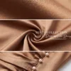 Váy Thiết Kế MDU6624 – Twist Satin Nâu, Nhún Eo Phối Hàng Ngọc Đính Thủ Công 15 Macro fabric detail images layout 4K 20260921100919 3 11zon Mdu Fashion