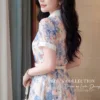 Váy Thiết Kế MDU6484 – Tơ Óng Hàn Kem Hồng, Họa Tiết Phong Cảnh Xanh Pastel Thanh Lịch 13 Model in photo pose 4K 202607021303 6 11zon Mdu Fashion