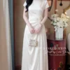 Váy Thiết Kế MDU6551 – Lụa Satin Trắng, Phối Hoa Thủ Công Đính Eo 2 Replace outfit on model 4K 20260910100443 11zon Mdu Fashion