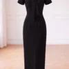 Váy Thiết Kế MDU6699 – Xước Thái Đen, Dáng Bút Chì Phối Nơ Bản Lớn Thanh Lịch 16 Replacing dress on mannequin 4K 202608111305 11zon Mdu Fashion