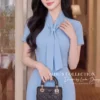Váy Thiết Kế MDU6697 – Xước Thái Xanh Baby, Nơ Cổ Bản Lớn Tôn Nét Thanh Lịch 11 Replacing outfit on model 4K 202608111546 8 11zon Mdu Fashion