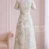 Váy Thiết Kế MDU6450 – Gấm Luxury Jacquard Kem Loang, Cổ Cao Đính Nơ Lớn Quý Phái 16 tao anh mat sau 4K 202608241034 Mdu Fashion
